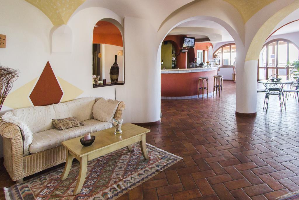 Hotel Li Graniti Baja Sardinia Exterior photo